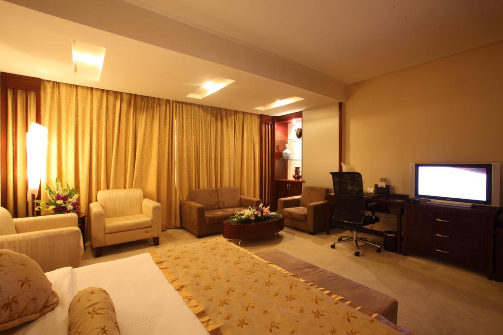 Beijing Wuhuan Hotel Habitación foto