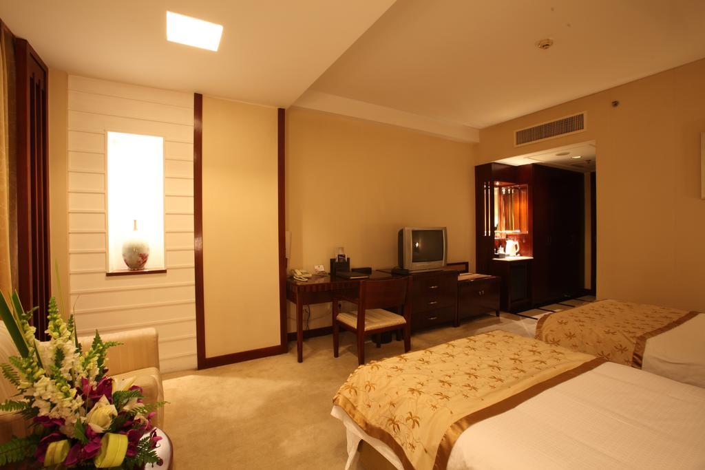 Beijing Wuhuan Hotel Habitación foto