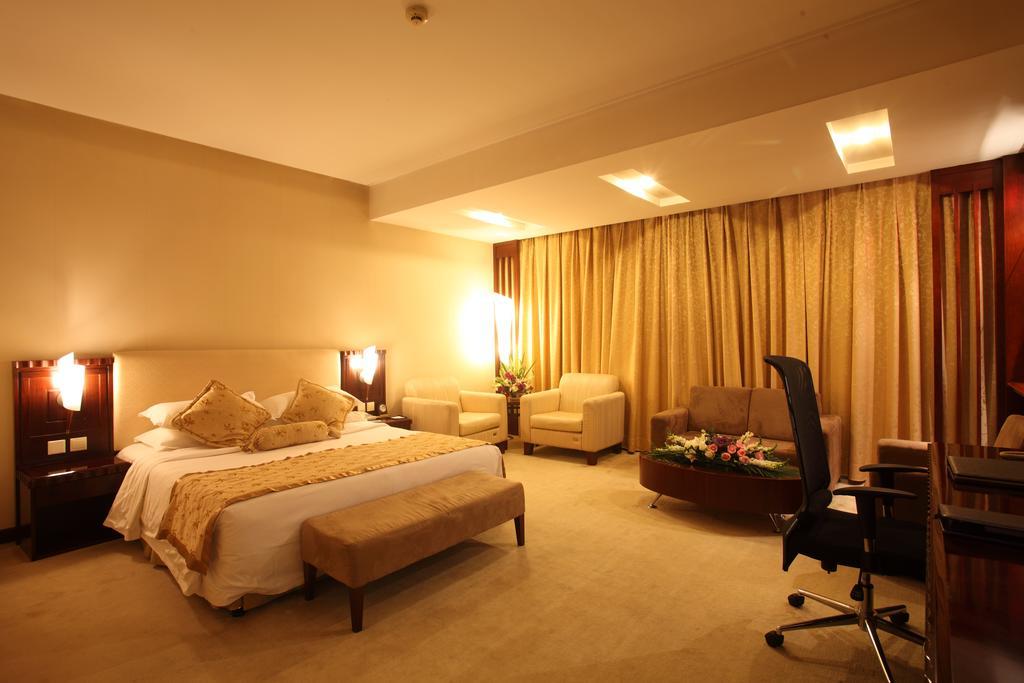 Beijing Wuhuan Hotel Habitación foto