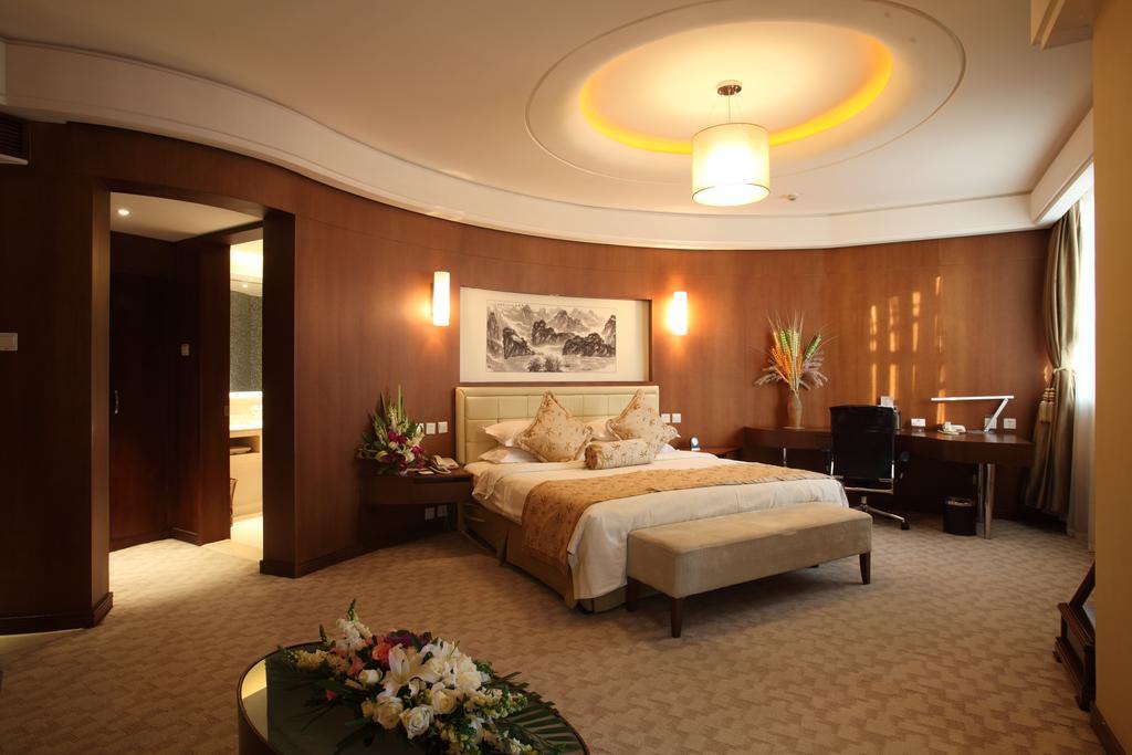 Beijing Wuhuan Hotel Habitación foto