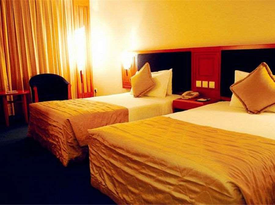 Beijing Wuhuan Hotel Habitación foto