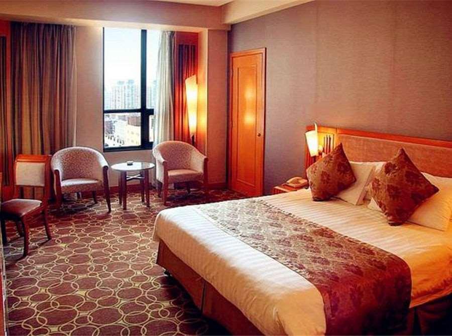 Beijing Wuhuan Hotel Habitación foto