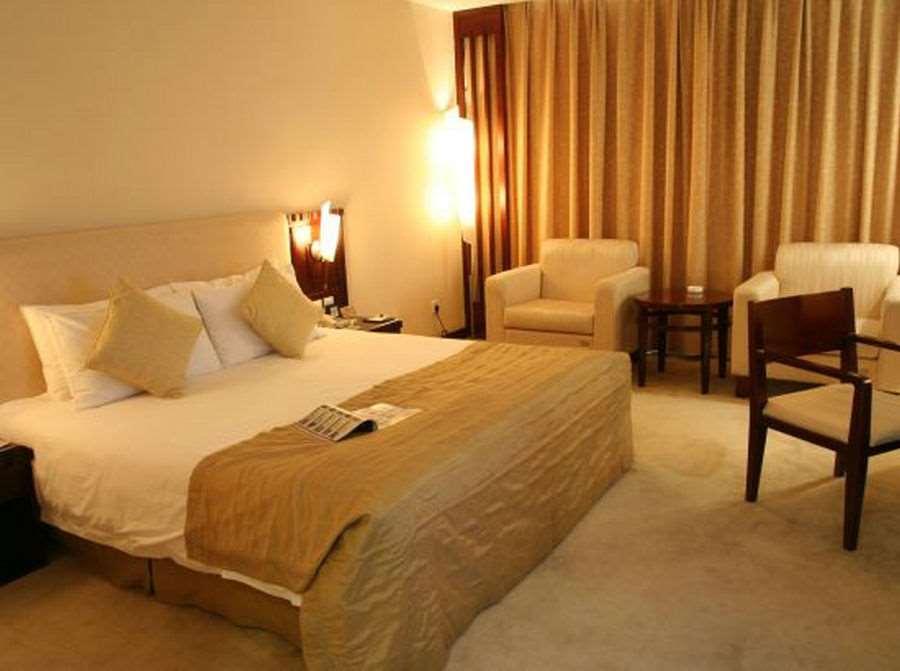 Beijing Wuhuan Hotel Habitación foto