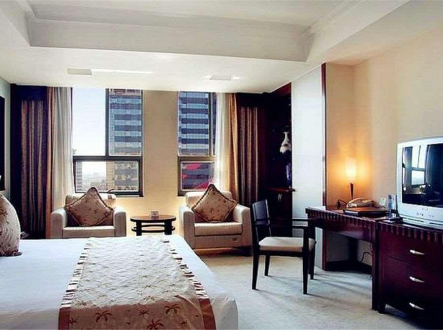 Beijing Wuhuan Hotel Habitación foto